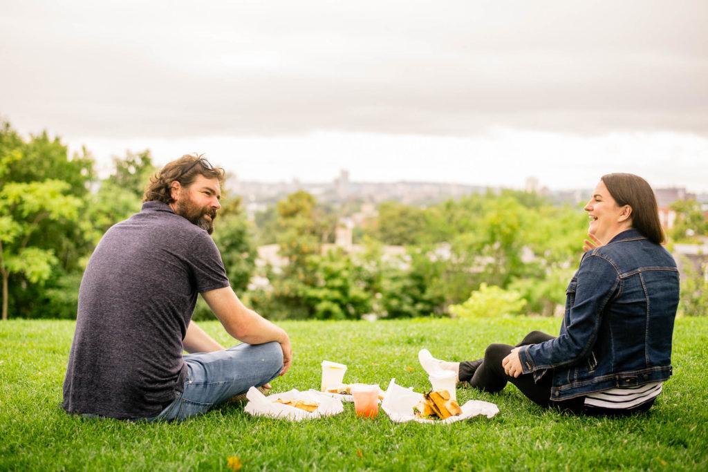 two people eating sandwiches from forge baking company in somerville