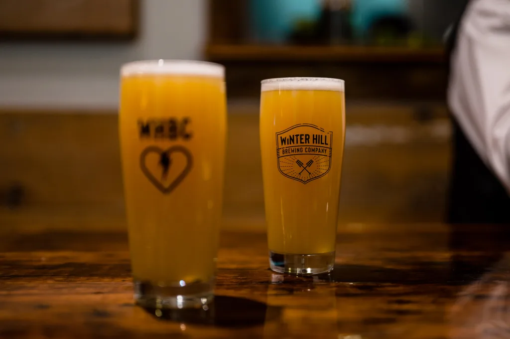 Two Winter Hill Brewing Company draft beers in a Somerville, MA bar