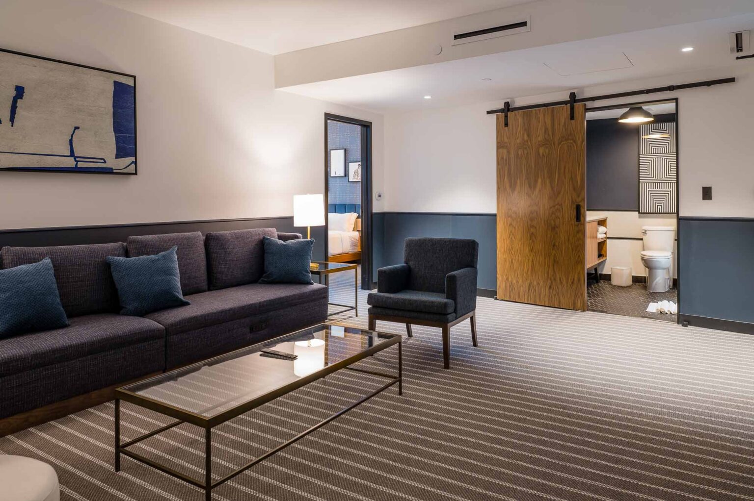 Multi-room hotel suite at Cambria in Boston-Somerville
