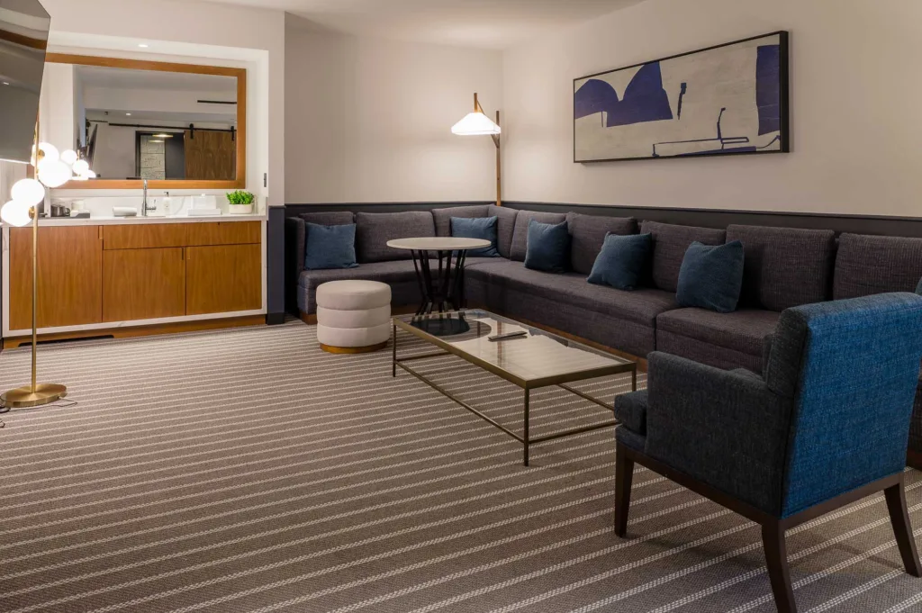 Large sofa in a lounge area at Cambria in Somerville-Cambridge