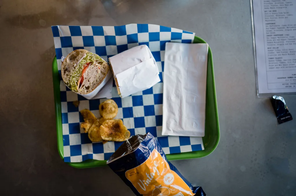 Sandwich and chips on a retro-style tray at a Harvard Square place to eat