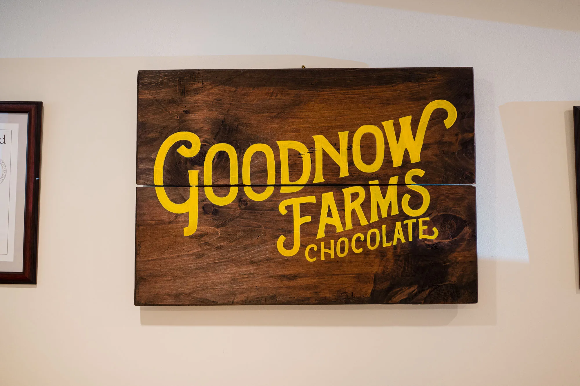 goodnow farms chocolate sign on a wall